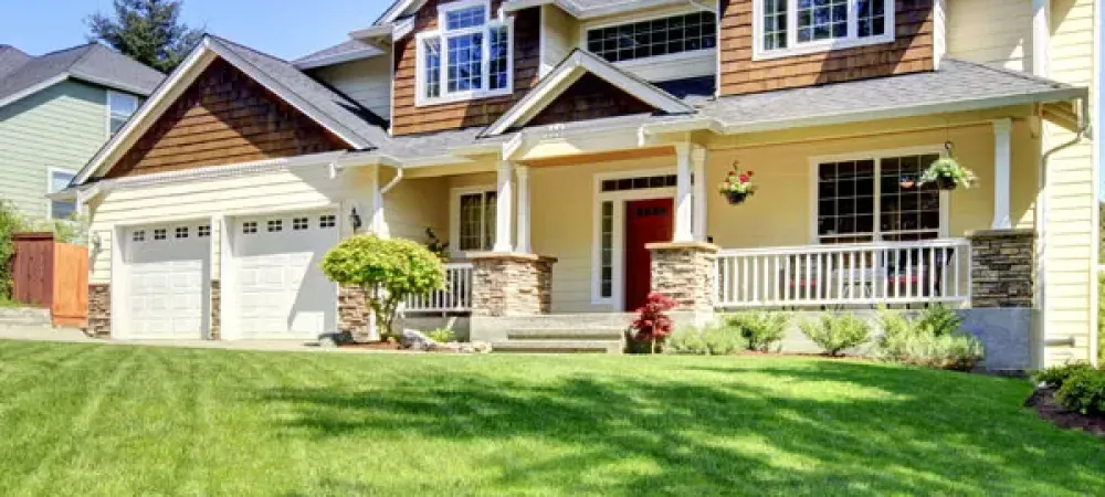 House with healthy green lawn